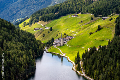 Italy, South Tyrol, Durnholz, Village on shore ofDurnholzerSee lake inSarntal Alps photo