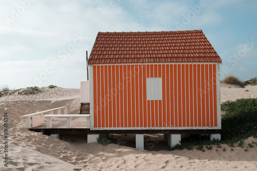 Portugal,Exterior of beach hut with tiled roof photo
