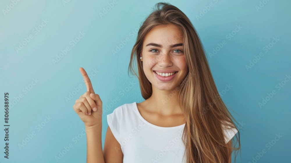 Woman Pointing Upwards with Smile Woman Pointing Upwards with Smile