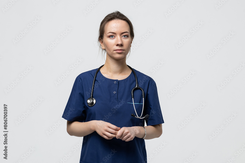 A European-looking nurse. Medical staff at the hospital. White isolated background A European-looking nurse. Medical staff at the hospital. White isolated background