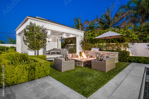 Backyard with a fire pit in a new construction home in Encino, California