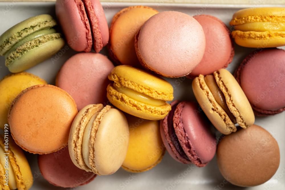 Macarons cookies in a plate, french macarons. Macarons cookies in a plate, french macarons.