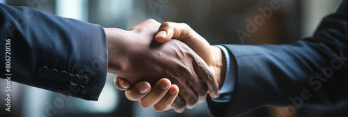 Professional Handshake Agreement Between Businessmen in Office - Corporate Deal Meeting, Formal Businesswear, Close-Up photo