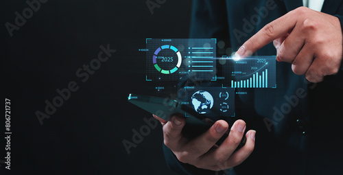 Business 2025 analytics tools charts and graphs with statistics to analyze business potential and forecast future development of companies growth. Businessman using a mobile phone.