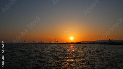Sunset sky view of Osaka North Port, sunset over the sea seen from Sunset Terrace © WildUp