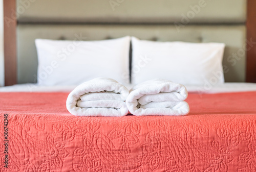 Clean white hotel towels on bed,Beautiful of fluffy bath towels