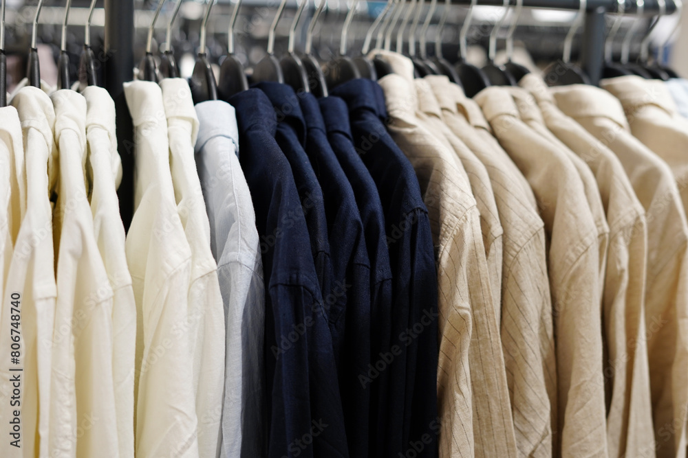 Men's shirts on hangers in a clothing store close-up Men's shirts on hangers in a clothing store close-up
