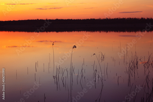sunset on the river, Scenic view of beautiful sunset or sunrise above the pond or lake © Leka
