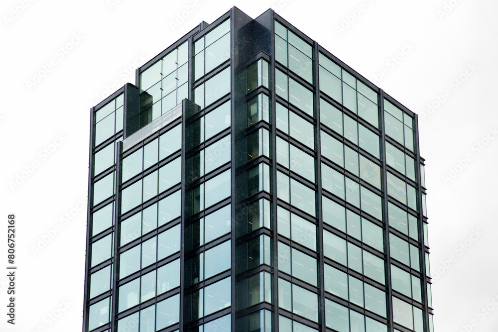 Glass windows of a tall skyscraper. Glass windows of a tall skyscraper.