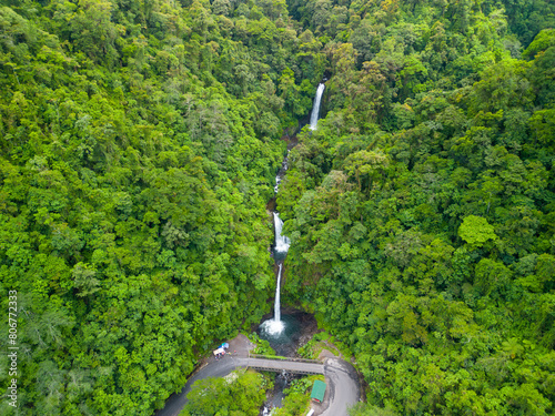 Aerial view of La Paz waterfall in Costa Rica, surrounded by lush green forest in Heredia photo