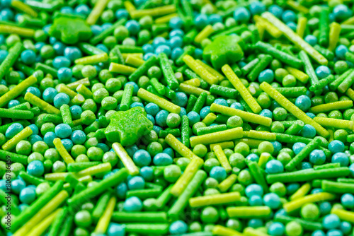 The texture of candy sprinkles.Varied sugar sprinkles, stars, flowers, dots.Holiday treat.Toppings for donuts,cupcake, desserts and ice cream .