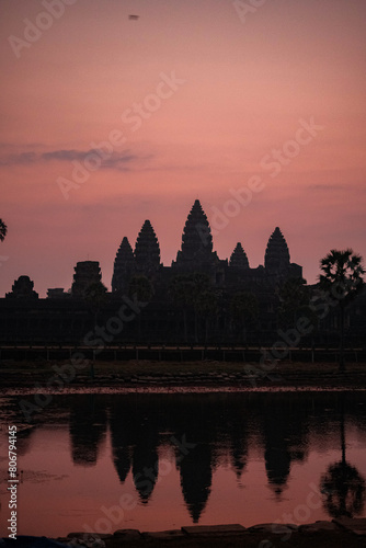 Angkor Wat at Dawn with Pink Sky and Reflective Lake