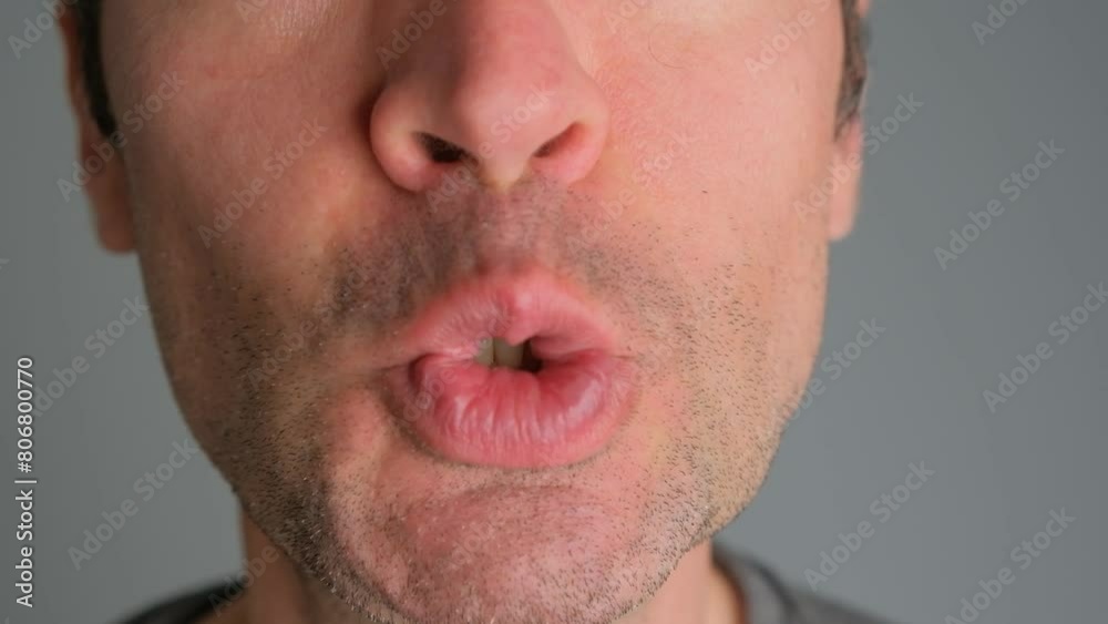 Emotional man bared his teeth, irritability close-up. Emotional man bared his teeth, irritability close-up.