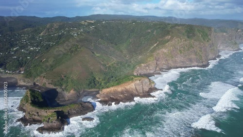 Kaiwhare Point, The Blue Pool, And Taitomo Island Near Tasman Lookout And Black Sand Piha Beach In New Zealand. aerial shot photo