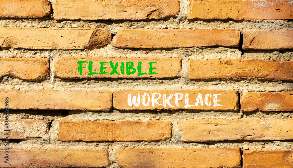 Flexible workplace symbol. Concept words Flexible workplace on beautiful brick wall. Beautiful red brown brick wall background. Business Flexible workplace concept. Copy space. Flexible workplace symbol. Concept words Flexible workplace on beautiful brick wall. Beautiful red brown brick wall background. Business Flexible workplace concept. Copy space.