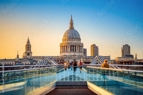 the famous st pauls cathedral of london during sunset photo