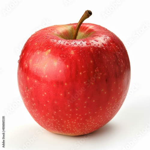 Ripe perfect red apple with water drops isolated on white background. Whole ripe red apple close-up