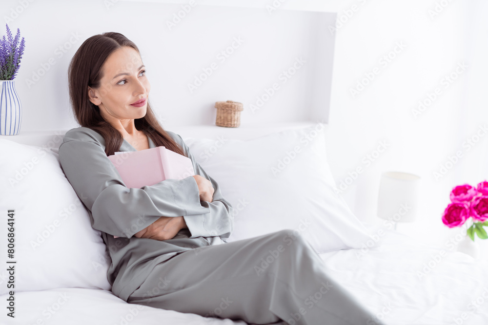 Photo of positive sweet lady grey sleepwear enjoy morning reading novel indoors home bedroom Photo of positive sweet lady grey sleepwear enjoy morning reading novel indoors home bedroom