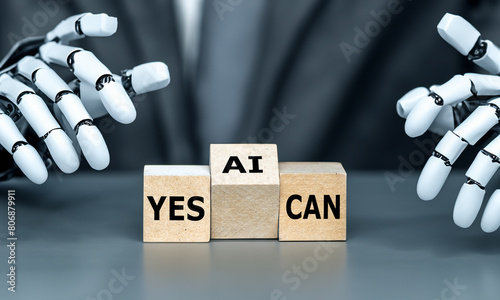 Robot hand turns cube and puts the letter 'AI' in to the expression'yes AI can'. Symbol that artificial intelligence technology is capable of something.