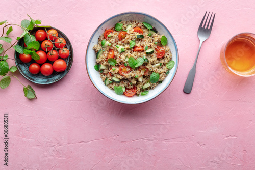 Wallpaper Mural Quinoa tabbouleh salad in a bowl, a healthy dinner with tomatoes and mint, shot from above with copy space Torontodigital.ca