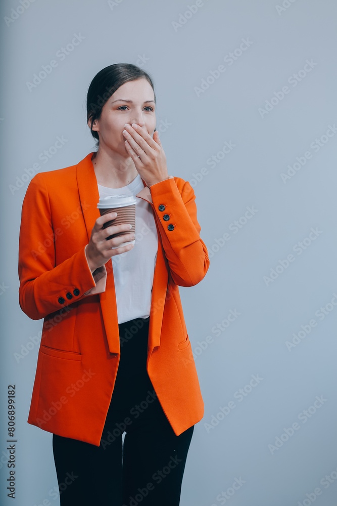 Business woman portrait with cup , isolated. Female model with long hair. Business woman portrait with cup , isolated. Female model with long hair.