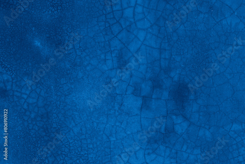 Old wall pattern texture cement blue dark abstract  blue color design are light with black gradient background. © Kamjana