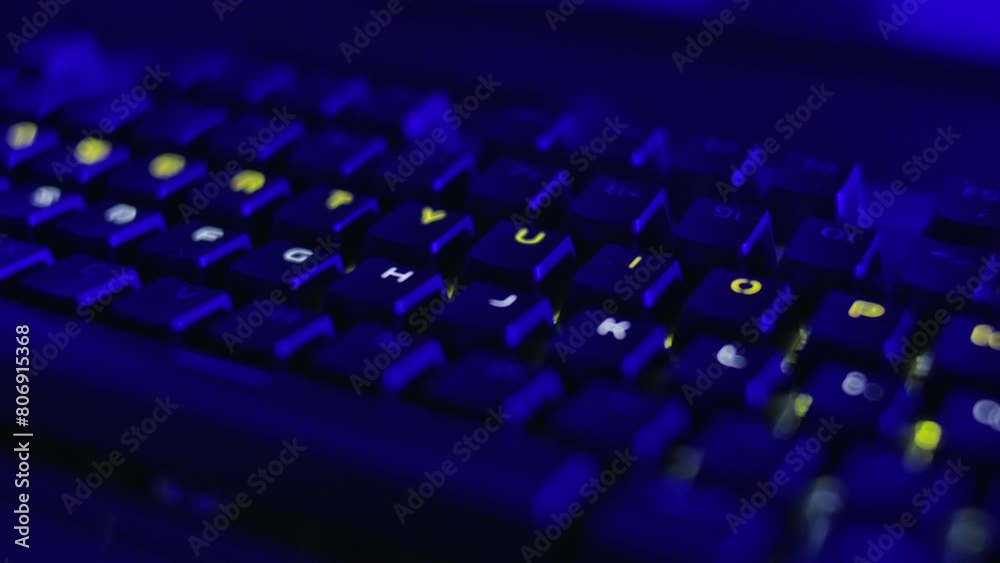 Gaming Keyboard With Rainbow of Colors Letters. PC RGB Keyboard is Glowing Neon Colors. Modern Backlit Keyboard With Pulsating RGB Colour Light. Cyber Sport Illuminated Mechanical Gaming Keyboard. Gaming Keyboard With Rainbow of Colors Letters. PC RGB Keyboard is Glowing Neon Colors. Modern Backlit Keyboard With Pulsating RGB Colour Light. Cyber Sport Illuminated Mechanical Gaming Keyboard.