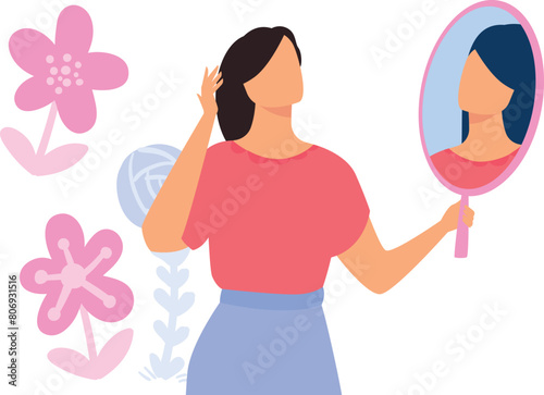 The girl is looking in the mirror.