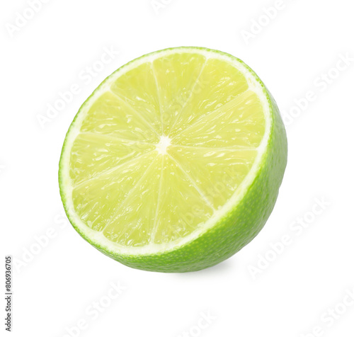 Half of fresh green ripe lime isolated on white