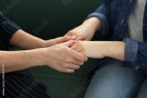 Psychotherapist working with patient in office, closeup