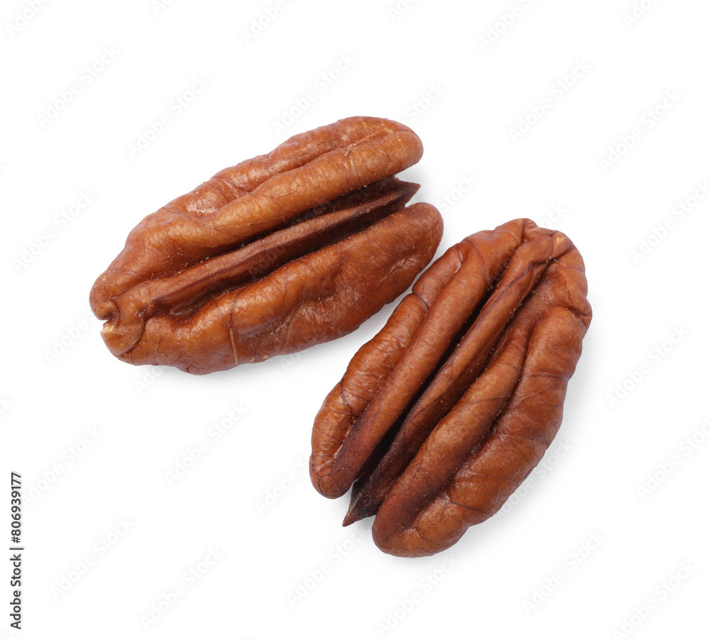 Tasty pecan nuts isolated on white, top view