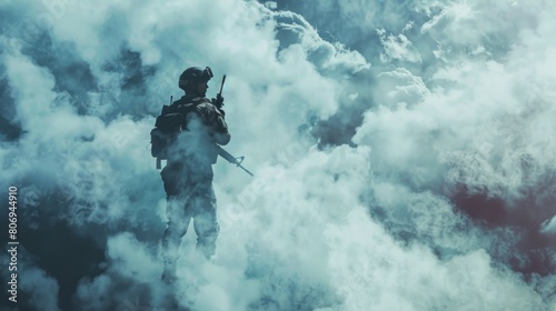 A man in a military uniform stands in the middle of a cloud of smoke © liliyabatyrova