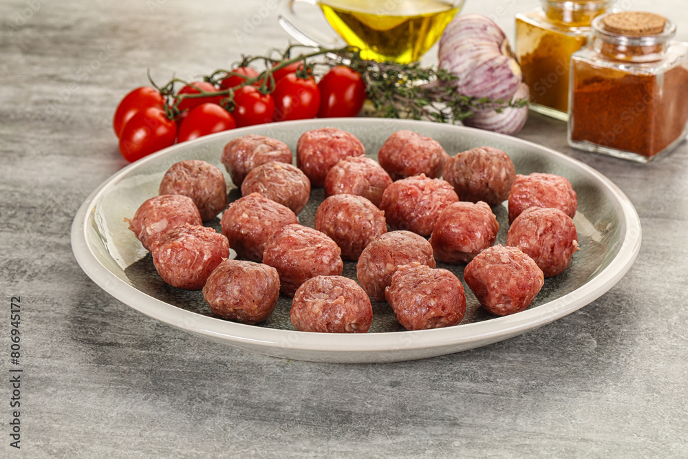 Uncooked raw beef meatball minced Uncooked raw beef meatball minced