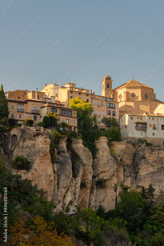 the medieval-style houses of Cuenca, Spain, perched on the edge of a rocky mountain