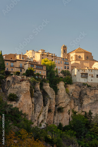 the medieval-style houses of Cuenca, Spain, perched on the edge of a rocky mountain