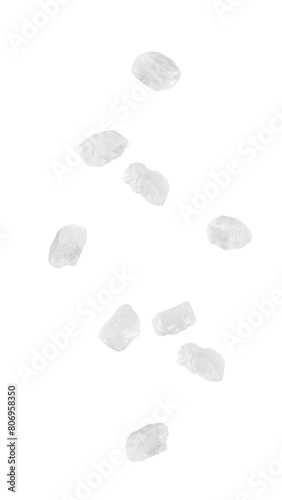 Falling sea salt isolated on white background, full depth of field