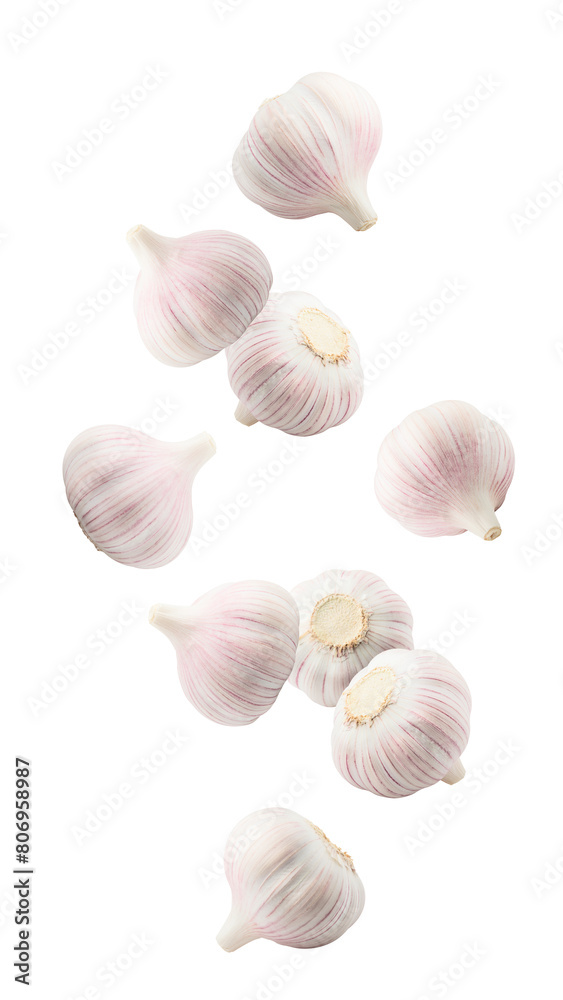 Falling garlic, isolated on white background, full depth of field Falling garlic, isolated on white background, full depth of field