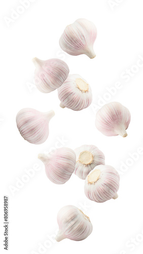 Falling garlic, isolated on white background, full depth of field © grey