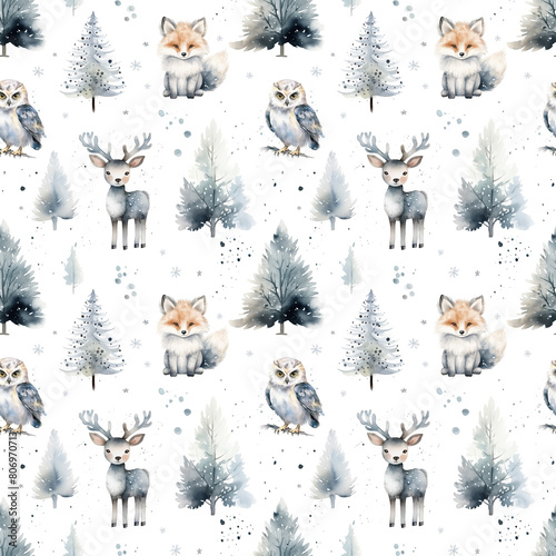 Watercolor seamless pattern of woodland animals: owl, fox, reindeer, and trees isolated on white background. © Nataliia Pyzhova