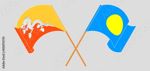 Crossed and waving flags of Bhutan and Palau