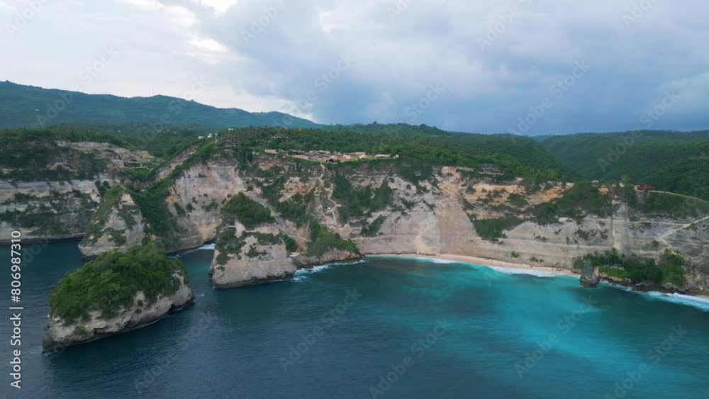 Diamond Beach Bali, one of the most beautiful destination in Bali with scenery of mountain rocks in the ocean on natural background 4K Diamond Beach Bali, one of the most beautiful destination in Bali with scenery of mountain rocks in the ocean on natural background 4K