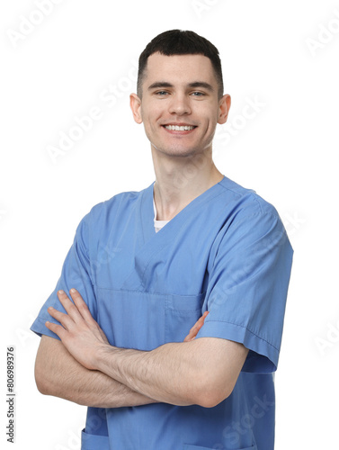 Portrait of smiling medical assistant with crossed arms on white background © New Africa