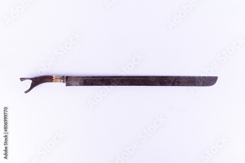 Pedang is a typical Indonesian weapon which has various shapes, sizes and carvings photo