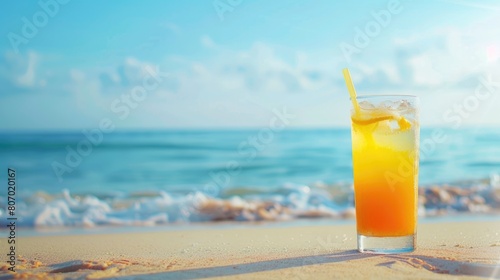 Refreshing summer drink with beach backdrop.