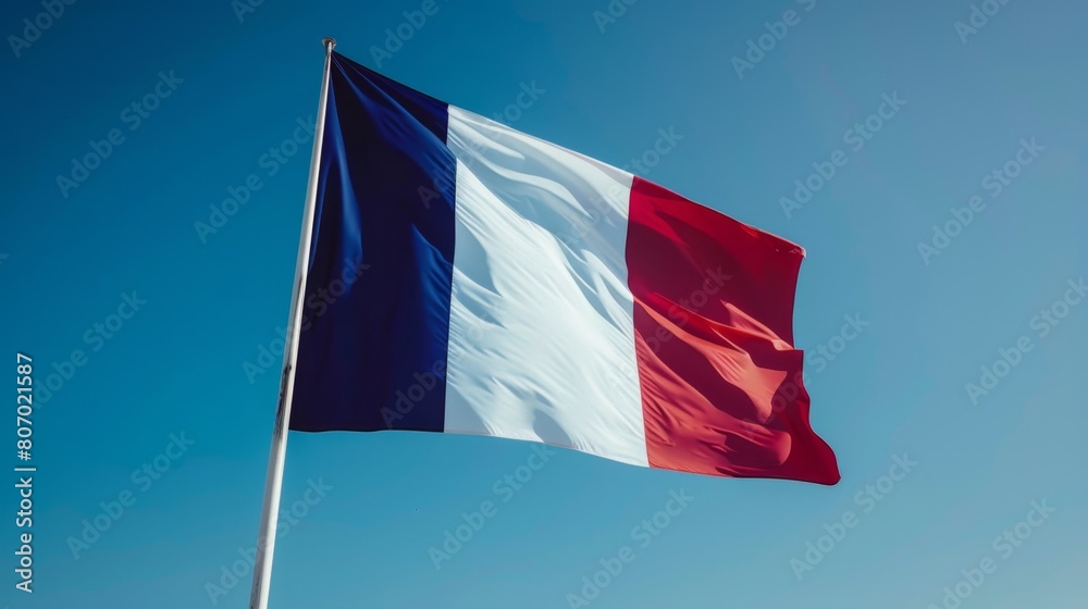 Majestic French Flag Waving Under Clear Blue Sky