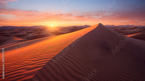 Sunset over the sand dunes in the Sahara desert  Morocco