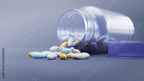 Many colorful tablets spilling out of package, Close up pills spilling out of pill bottle on blue background. Medicine, medical insurance or pharmacy concept close up with copy space.