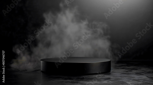 Black plaform on black studio background with smoke