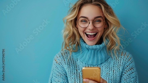 Young Woman's Excitement Reading Amazing News on Mobile Phone
