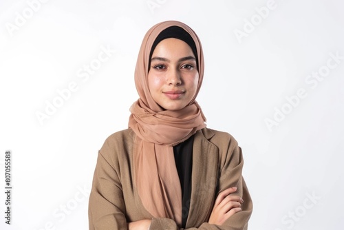 pretty young muslim woman full length studio portrait on white